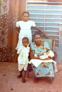 Abdou with his family in Burkina Faso (1990)