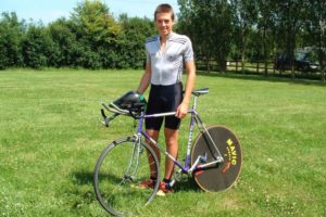 Alex aged [?] with one of his early road bikes in Essex (YYYY)