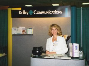 Laurie representing her own company at an industry conference in 1996