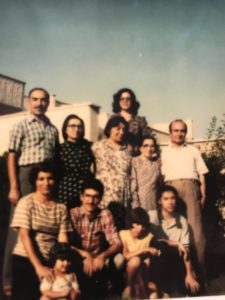 Flora Peyvandi aged 13 with her family in Iran.