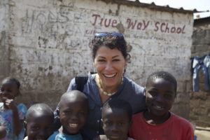 Flora pictured on a humanitarian aid trip in Zambia.
